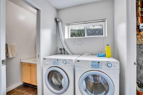 219 Coachway Lane Sw, Calgary, AB - Indoor Photo Showing Laundry Room