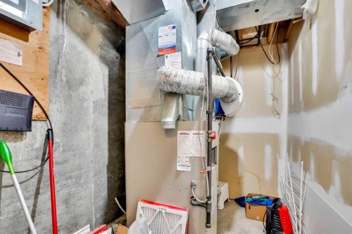 219 Coachway Lane Sw, Calgary, AB - Indoor Photo Showing Basement