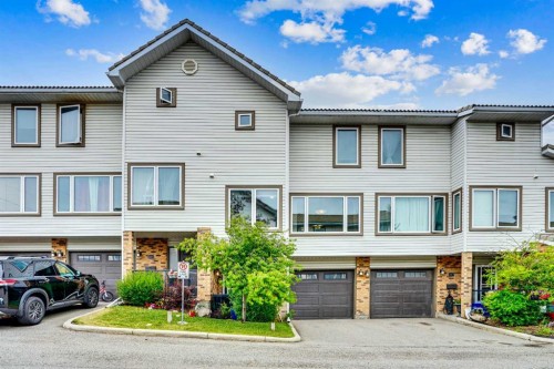 219 Coachway Lane Sw, Calgary, AB - Outdoor With Facade