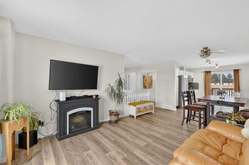 1175 Strathcona Road, Strathmore, AB - Indoor Photo Showing Living Room With Fireplace