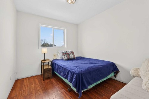 1175 Strathcona Road, Strathmore, AB - Indoor Photo Showing Bedroom