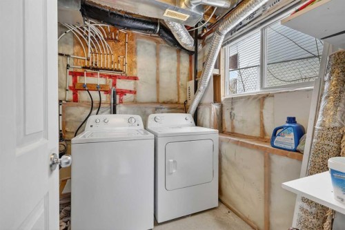 1175 Strathcona Road, Strathmore, AB - Indoor Photo Showing Laundry Room