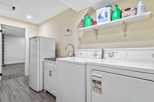 222 Springwood Place Sw, Calgary, AB - Indoor Photo Showing Laundry Room