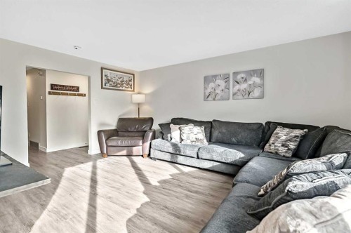222 Springwood Place Sw, Calgary, AB - Indoor Photo Showing Living Room