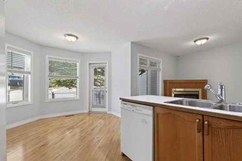 88 Scenic Gardens Nw, Calgary, AB - Indoor Photo Showing Kitchen With Double Sink
