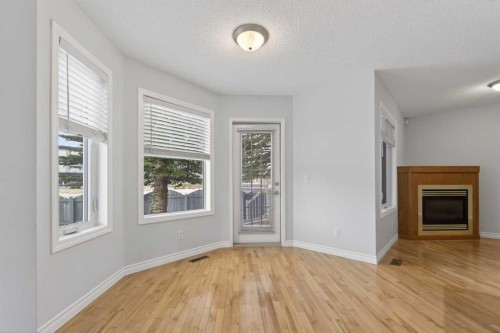 88 Scenic Gardens Nw, Calgary, AB - Indoor With Fireplace