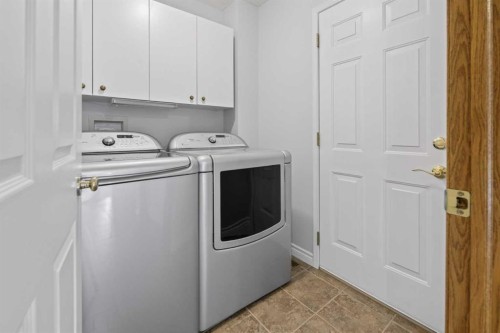88 Scenic Gardens Nw, Calgary, AB - Indoor Photo Showing Laundry Room