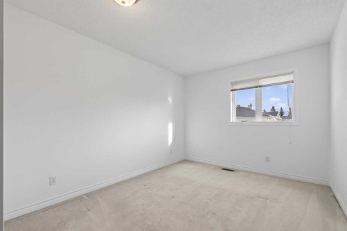 88 Scenic Gardens Nw, Calgary, AB - Indoor Photo Showing Other Room