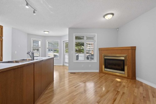 88 Scenic Gardens Nw, Calgary, AB - Indoor With Fireplace