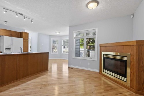 88 Scenic Gardens Nw, Calgary, AB - Indoor With Fireplace