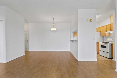 304-2022 Canyon Meadows Drive Se, Calgary, AB - Indoor Photo Showing Kitchen
