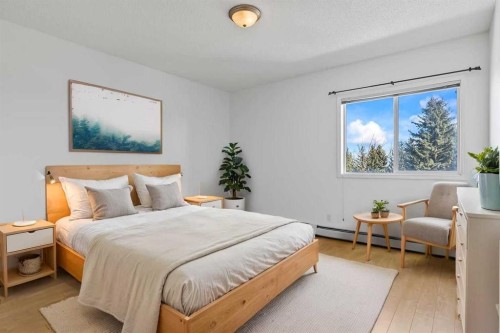 304-2022 Canyon Meadows Drive Se, Calgary, AB - Indoor Photo Showing Bedroom