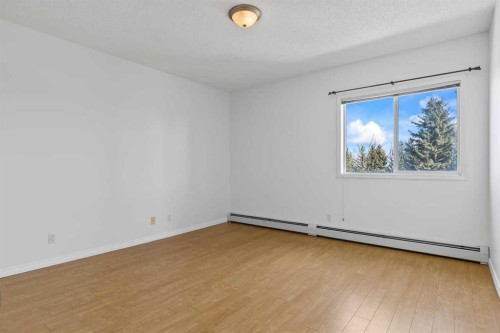 304-2022 Canyon Meadows Drive Se, Calgary, AB - Indoor Photo Showing Other Room