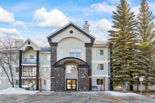 304-2022 Canyon Meadows Drive Se, Calgary, AB - Outdoor With Balcony With Facade