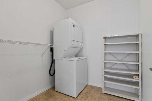 304-2022 Canyon Meadows Drive Se, Calgary, AB - Indoor Photo Showing Laundry Room