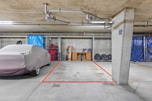 304-2022 Canyon Meadows Drive Se, Calgary, AB - Indoor Photo Showing Garage