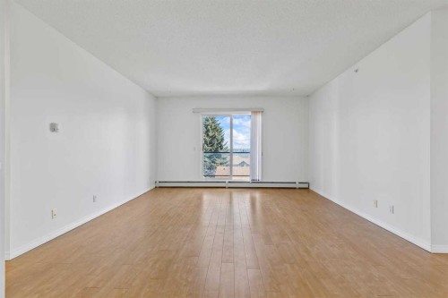 304-2022 Canyon Meadows Drive Se, Calgary, AB - Indoor Photo Showing Other Room