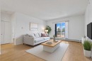304-2022 Canyon Meadows Drive Se, Calgary, AB  - Indoor Photo Showing Living Room 