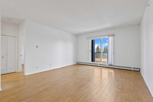 304-2022 Canyon Meadows Drive Se, Calgary, AB - Indoor Photo Showing Other Room