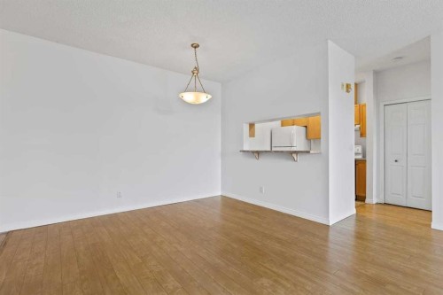 304-2022 Canyon Meadows Drive Se, Calgary, AB - Indoor Photo Showing Other Room