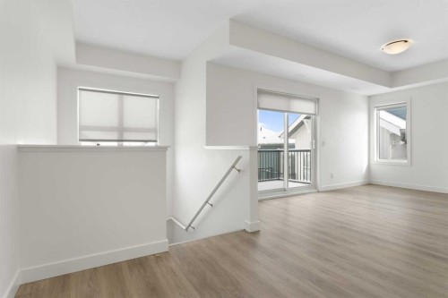 1103-24 Rivercrest Drive, Cochrane, AB - Indoor Photo Showing Other Room