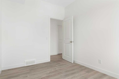 1103-24 Rivercrest Drive, Cochrane, AB - Indoor Photo Showing Other Room