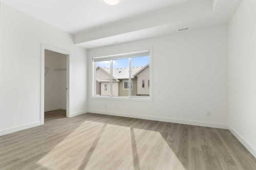 1103-24 Rivercrest Drive, Cochrane, AB - Indoor Photo Showing Other Room