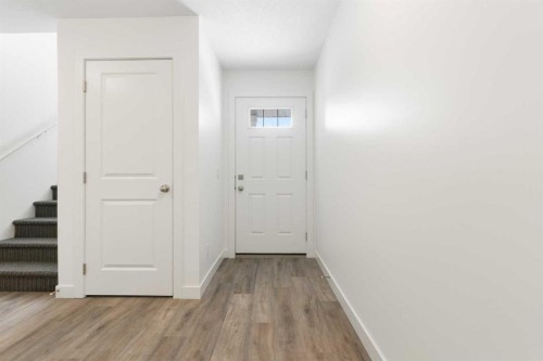 1103-24 Rivercrest Drive, Cochrane, AB - Indoor Photo Showing Other Room