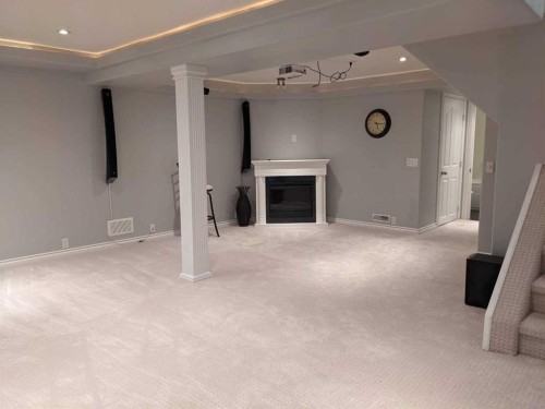 320 Midpark Gardens Se, Calgary, AB - Indoor With Fireplace