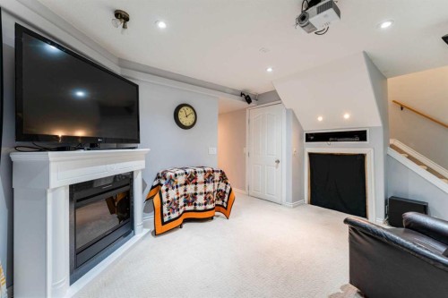 320 Midpark Gardens Se, Calgary, AB - Indoor With Fireplace