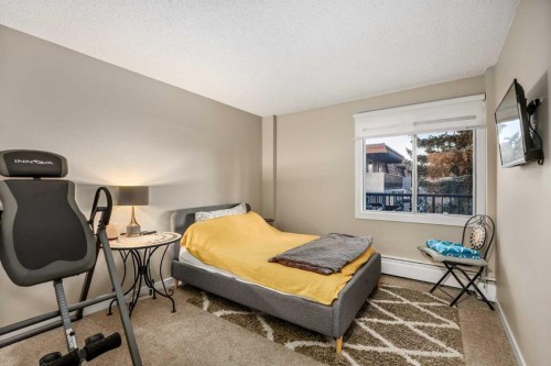 75D-231 Heritage Drive Se, Calgary, AB - Indoor Photo Showing Bedroom
