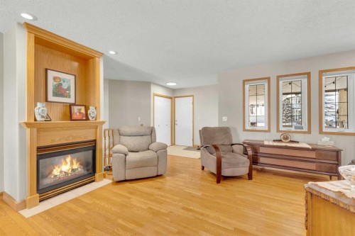 10 Park Lane, Olds, AB - Indoor Photo Showing Living Room With Fireplace