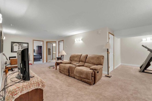 10 Park Lane, Olds, AB - Indoor Photo Showing Gym Room