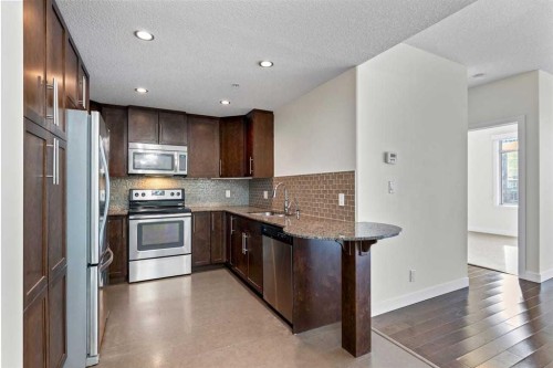 310-16 Varsity Estates Circle Nw, Calgary, AB - Indoor Photo Showing Kitchen With Stainless Steel Kitchen