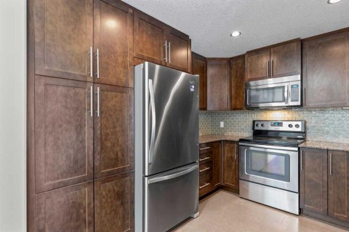 310-16 Varsity Estates Circle Nw, Calgary, AB - Indoor Photo Showing Kitchen With Stainless Steel Kitchen