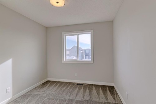 132 Wolf Willow Boulevard Se, Calgary, AB - Indoor Photo Showing Other Room