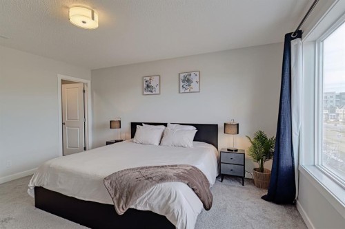132 Wolf Willow Boulevard Se, Calgary, AB - Indoor Photo Showing Bedroom