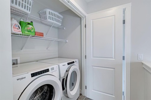 132 Wolf Willow Boulevard Se, Calgary, AB - Indoor Photo Showing Laundry Room