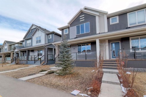 132 Wolf Willow Boulevard Se, Calgary, AB - Outdoor With Deck Patio Veranda With Facade