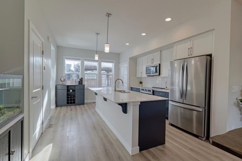 132 Wolf Willow Boulevard Se, Calgary, AB - Indoor Photo Showing Kitchen With Stainless Steel Kitchen With Upgraded Kitchen