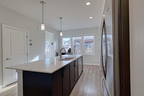 132 Wolf Willow Boulevard Se, Calgary, AB - Indoor Photo Showing Kitchen With Double Sink
