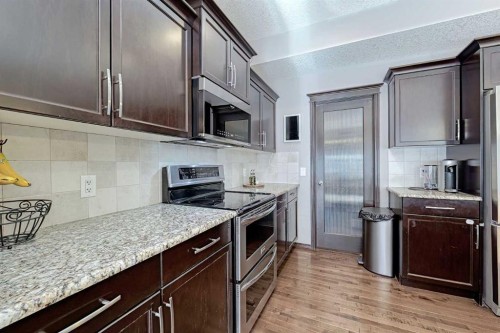 133 Evanspark Circle Nw, Calgary, AB - Indoor Photo Showing Kitchen With Stainless Steel Kitchen