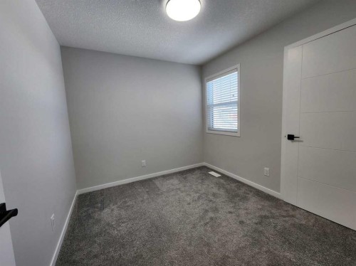 365 Edith Road Nw, Calgary, AB - Indoor Photo Showing Other Room