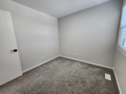365 Edith Road Nw, Calgary, AB - Indoor Photo Showing Other Room