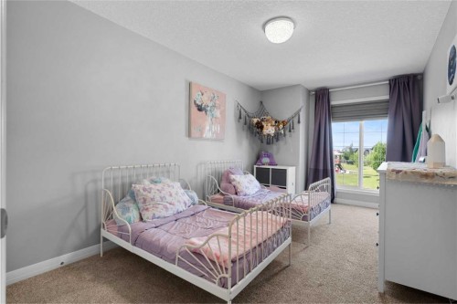 103 Masters Rise Se, Calgary, AB - Indoor Photo Showing Bedroom