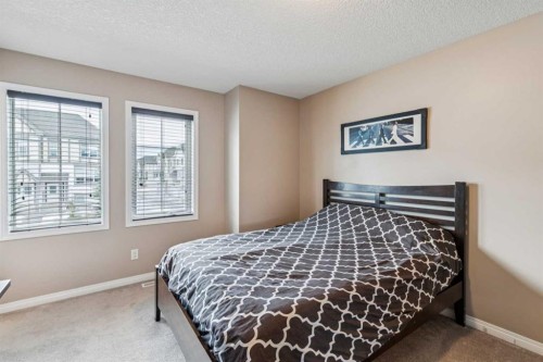 77 New Brighton Heights Se, Calgary, AB - Indoor Photo Showing Bedroom