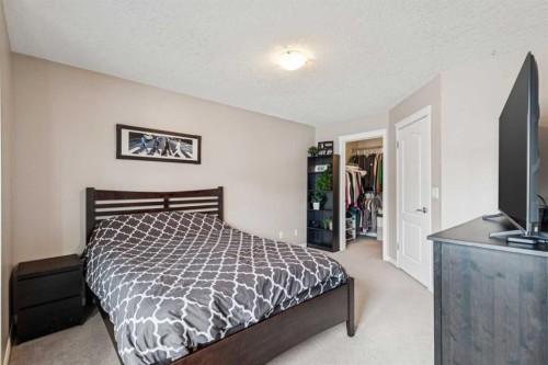 77 New Brighton Heights Se, Calgary, AB - Indoor Photo Showing Bedroom