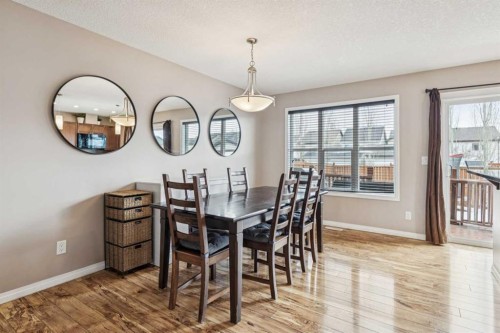 77 New Brighton Heights Se, Calgary, AB - Indoor Photo Showing Dining Room