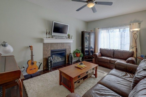 136 Chaparral Valley Terrace Se, Calgary, AB - Indoor Photo Showing Living Room With Fireplace