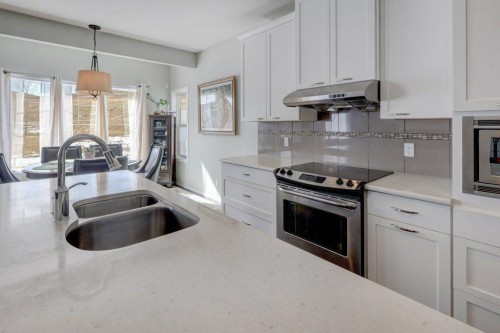 136 Chaparral Valley Terrace Se, Calgary, AB - Indoor Photo Showing Kitchen With Double Sink With Upgraded Kitchen